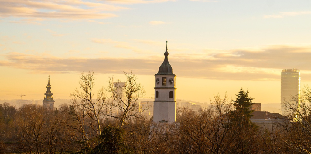 Panoramic view of Belgrade Kalemegdan Fortress clock tower at golden hour sunset