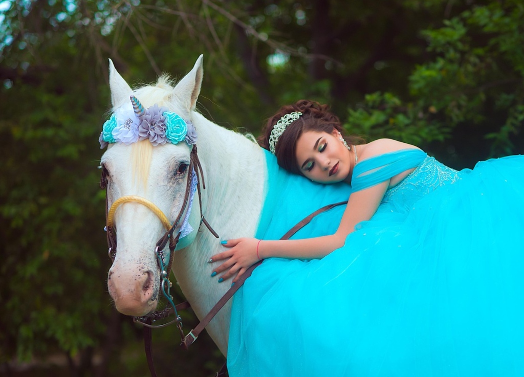 Slavic bride in elegant gown embracing white horse - traditional marriage dreams